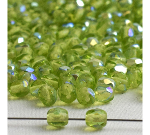 Намистини Preciosa скляні 50520/15495 Crystal Peridot ( 4 мм.). Колір: салатовий, прозорый, райдужний 50 гр. (+-645 шт.)0